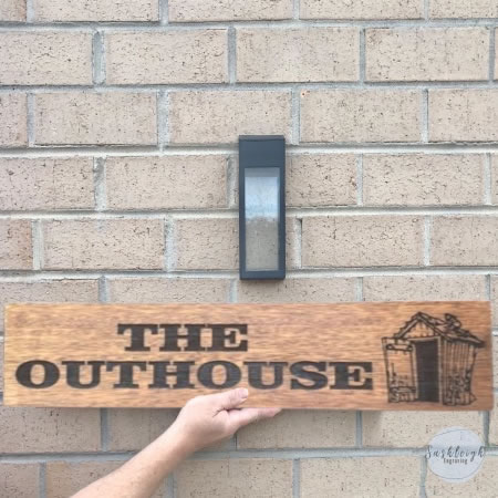 The Outhouse Sign