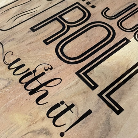 Engraved Wooden Chopping Board – “In This Kitchen We Dance” (500×300 mm)