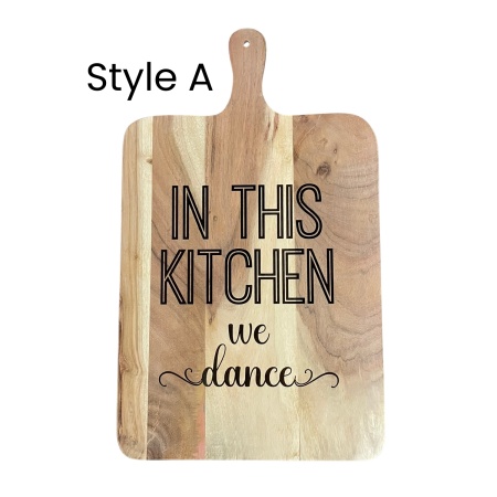 Engraved Wooden Chopping Board – “In This Kitchen We Dance” (500×300 mm)